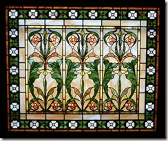 Stained glass window located in the stair well on the second floor of the Weld County Court House.