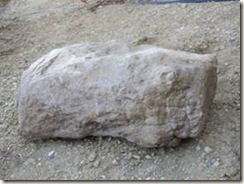 Section of corner stone recently recovered while surveying near the town of Grover.